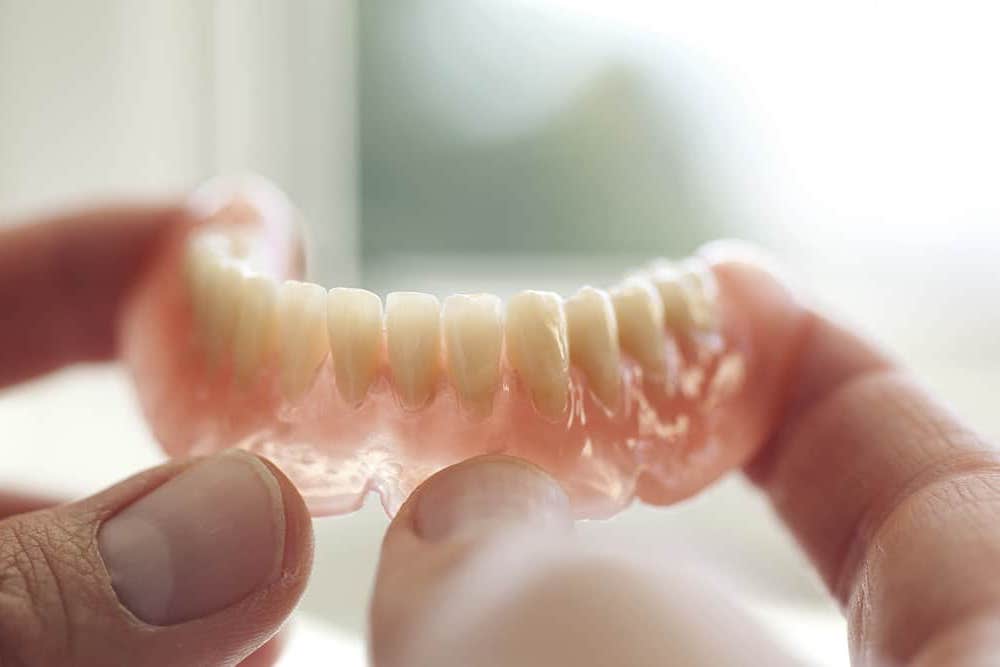 Reasons Bottom Dentures Won T Stay In And How To Fix Them European Denture Center