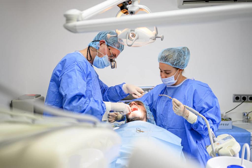 Two dentists fixing a patient's broken dental implant.