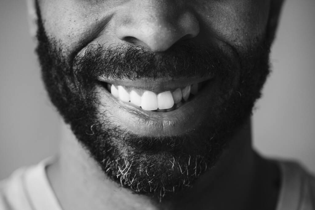closeup of smiling teeth of a black man 2022 12 16 01 22 24 utc