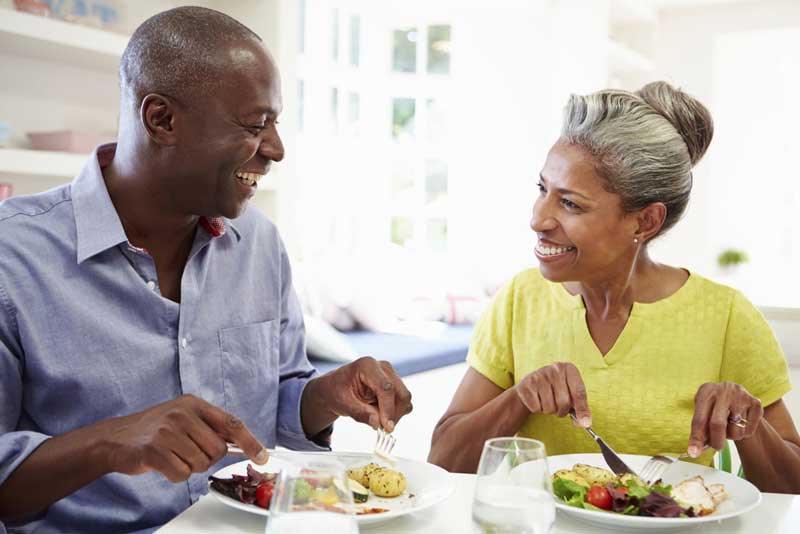 Mature couple eating