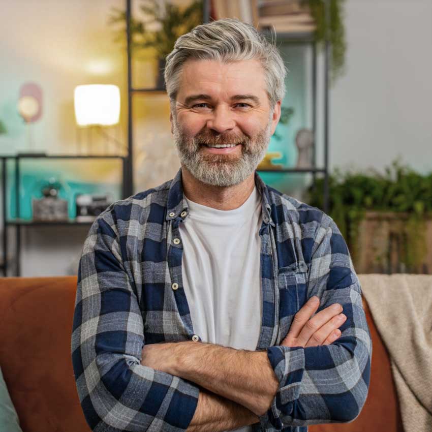 satisfied-mature-man-folded-arms same day dentures